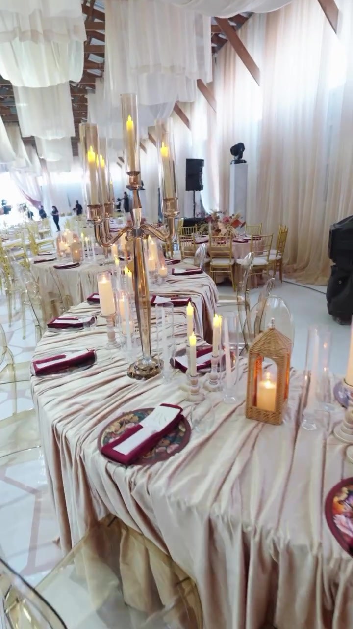 Velvet linens, candelabras and gold chiavari chairs at a farm wedding near Toronto